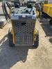 Stand behind gasoline, powered mini skid steer - 5