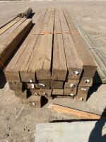 Bundle of 14 foot treated 6 x 6 timbers