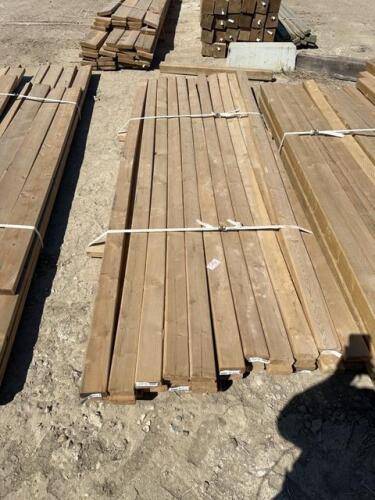Bundle of 10 foot treated 2 x 4