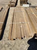 Bundle of 10 foot treated 2 x 4