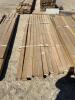 Bundle of 10 foot treated 2 x 4