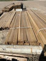 Bundle of 12 foot treated 4 x 4