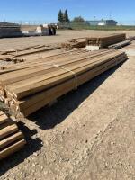 Bundle of 16 foot treated 4 x 4