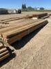 Bundle of 16 foot treated 4 x 4