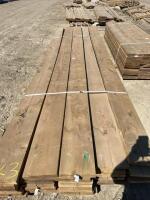 Bundle of treated 14 x 2 x 10