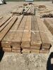 Bundle of 2 x 10 treated by 8 feet
