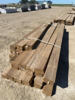Bundle of treated 4 x 6 timbers