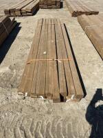 Bundle of 8 foot treated 4 x 4