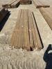 Bundle of 8 foot treated 4 x 4