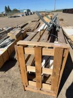Crate of new door panels and galvanized steel track/hardware/sweep