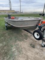 Aluminum fishing boat with motor and trailer