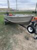 Aluminum fishing boat with motor and trailer