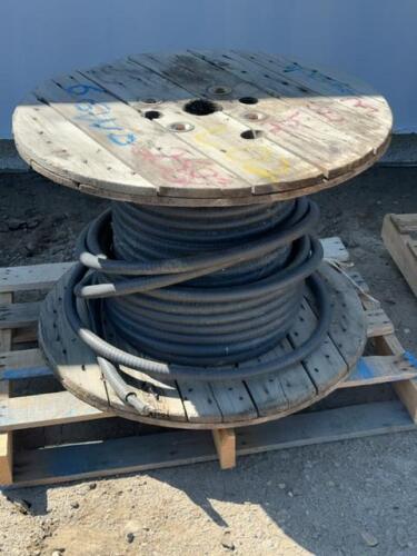 Partial spool of four wire electric electrical cable