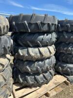 Stack of five pivot tires on steel rims