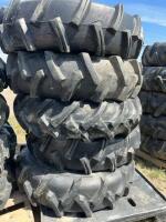 Stack of five pivot tires mounted on steel rims