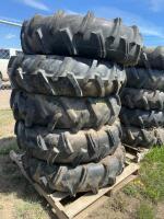 Stack of five pivot tires mounted on steel rims