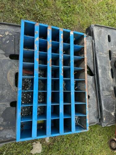 Blue steel bolt bin and contents