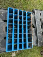 Blue steel bolt bin and contents