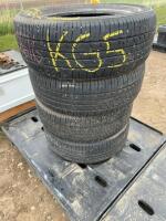 Stack of four Open Country Toyo tires