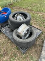 Three Toyo car, tire tires and two aluminum BMW rims