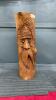 WOOD CARVING OF A FACE OF AN OLD MAN