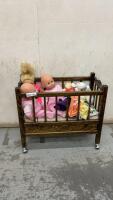 ROLLING DOLL CRIB W/ (3) DOLLS