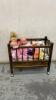 ROLLING DOLL CRIB W/ (3) DOLLS