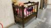ROLLING DOLL CRIB W/ (3) DOLLS - 2