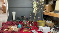 BOX OF DECOR ITEMS - FAKE FLOWERS, WROUGHT IRON CANDLE HOLDER, METAL MATCH HOLDER, MVINTAGE JAR LIFTER, AVON COLOGNE BOTTLES