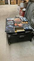 SUITCASE FULL OF DVD&rsquo;S