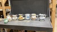 (7) ASSORTED SIZES OF DECORATIVE GLASS PITCHERS AND PLATE