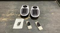 (2) PLUG IN ELECTRONIC HEATERS W REMOTES