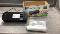 FOOD SAVER WITH SOME PLASTIC ROLL