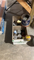 Wooden crate with collector tins