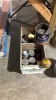 Wooden crate with collector tins