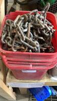 RED BUCKET WITH TIRE CHAINS