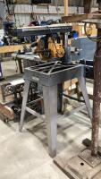 DEWALT RADIAL ARM SAW ON METAL STAND