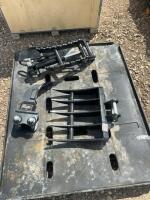 Palet of three mini excavator attachments