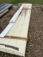 17 sheets of used steel roof roofing and some white vynal siding