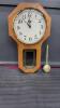 FORESTVILLE BATTERY OPERATED WALL CLOCK W/ A PENDULUM
