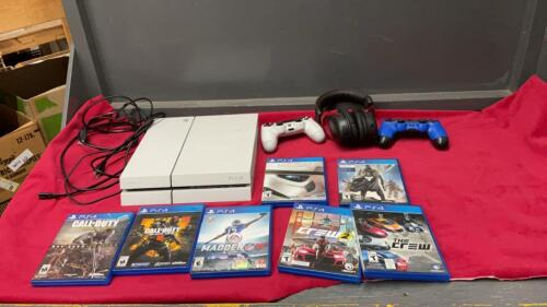 PS4 CONSOLE W/ (2) CONTROLLERS & HEADSET W/GAMES