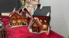 (2) BOXES OF CHRISTMAS VILLAGE PIECES - HOUSES, FIGURINES, ACCESSORIES ETC. - 12