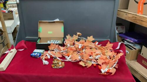 BOX OF FALL DECOR - LIGHTED GARLAND OF LEAVES, EXTRA BULBS, AND A LITTLE ORNAMENT