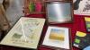 BOX W/ FRAMES AND PICTURES - (2) CROSS STITCH PICTURES AND A VARIETY OF PICTURE FRAMES - 4