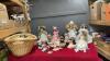 PORCELAIN DOLLS IN WICKER BASKET - SOME WITH STANDS