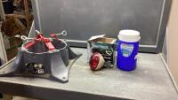 (3)ITEMS - CHRISTMAS TREE STAND, HEAT LAMP BULBS, COLEMAN WATER JUG
