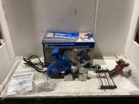 POWERFIST ELETRIC CHAIN SAW SHARPENER W/ CONTENTS