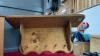 (3) WOOD DECOR PIECES - (2) WALL SHELVES: 1 W/ HOOKS, AND A SMALL WOODEN CABINET W/ HEART CUTOUTS - 2