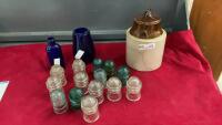 PICKLE CROCK, GLASS INSULATORS AND A COBALT BLUE JAR AND LANTERN COVER