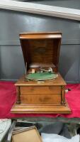 COLUMBIA GRAFONOLA RECORD PLAYER IN AN OAK CABINET